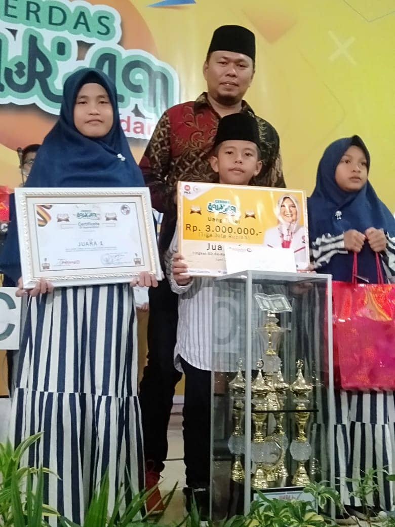 Cerdas Qur’an Tingkat SD dan SMP, Nevi Zuairina Sampaikan Pentingnya Satu Rumah Minimal Satu Anak Penghafal Qur’an